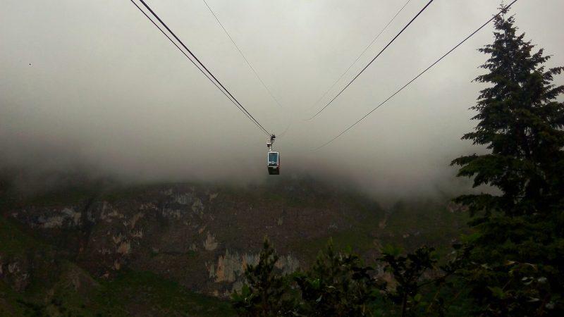 The cable car from Fuente De goes through the clouds