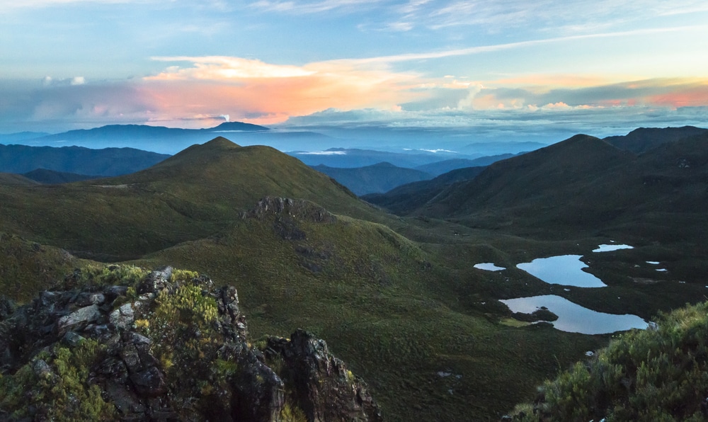 Volcán Turrialba erupts in the distance at sunrise, as seen from the summit of Cerro Chirripó, the highest point in Costa Rica.