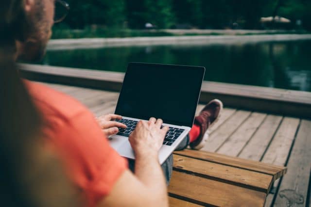 remote worker laptop outdoor